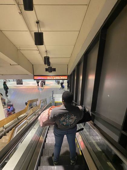Me Carrying our bags in the airport