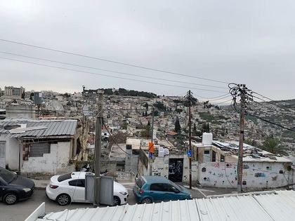 views outside of wall around jerusalem with "arabs"